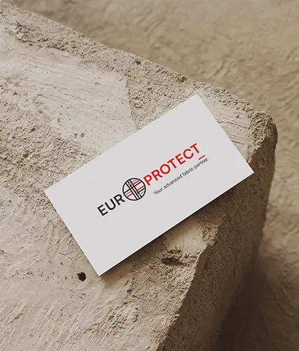 Carte de visite Europrotect posée sur une pierre brute, création graphique B2B